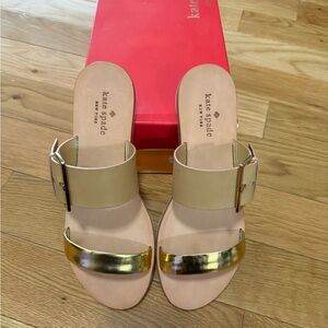 Brand new in box Kate Spade Gold Slides, size 8